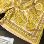 Versace baroque print shorts fabric in yellow and white with ornate border
