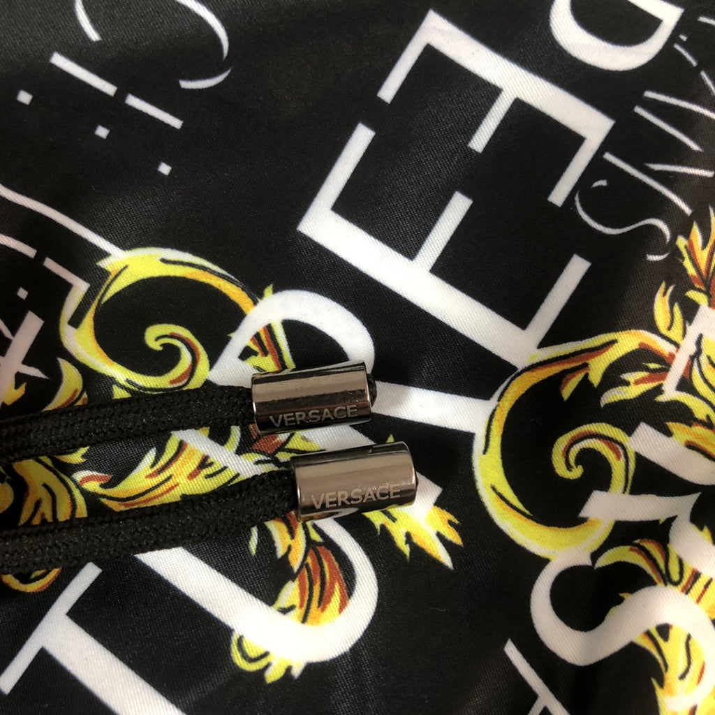 Patterned shorts waistband, black drawstring with gold VERSACE logo tips