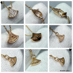 Bvlgari Accessories necklace with crescent-shaped pavé pendant, gold-tone chain