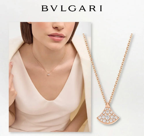 Bvlgari Accessories necklace with gold-tone chain and pavé crescent pendant detail