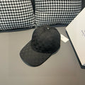 Balenciaga baseball cap in dark charcoal with GG-style monogram pattern