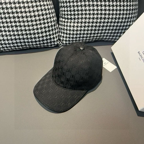Balenciaga baseball cap in dark charcoal with GG-style monogram pattern