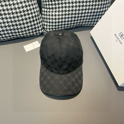 Balenciaga baseball cap in dark charcoal with allover monogram print and button top