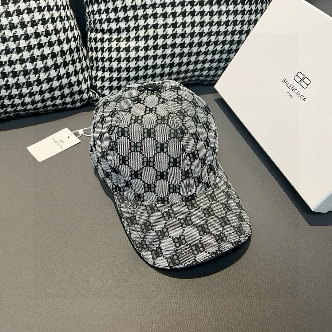 Patterned baseball cap with curved brim and dark monogram repeat allover