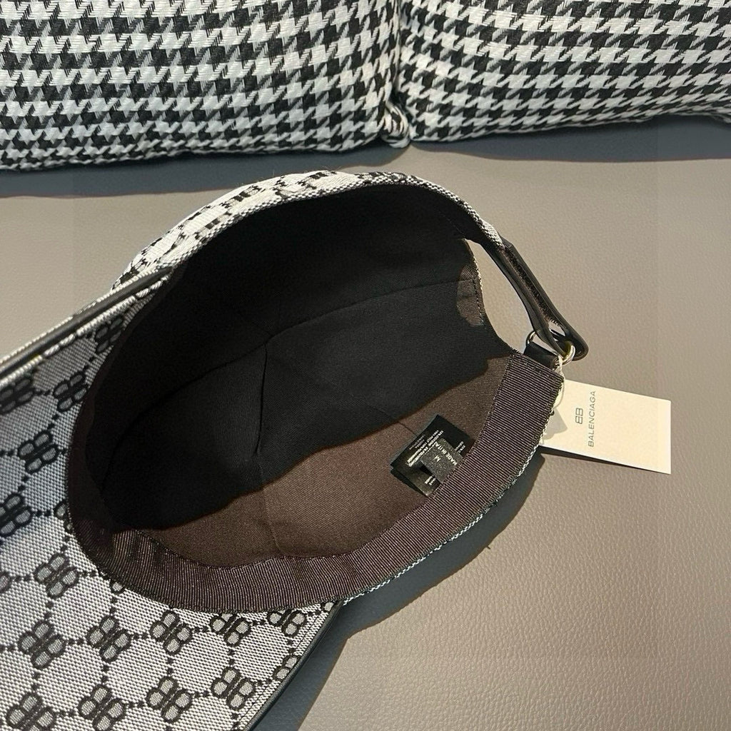 Inside view of monogram baseball cap with black interior lining and strap