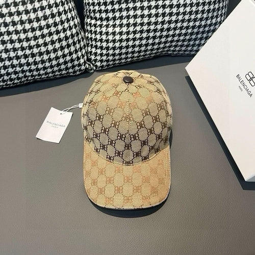 Beige monogram baseball cap with curved brim and dark underbrim panel
