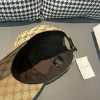 Beige monogram baseball cap with black lining and adjustable strap