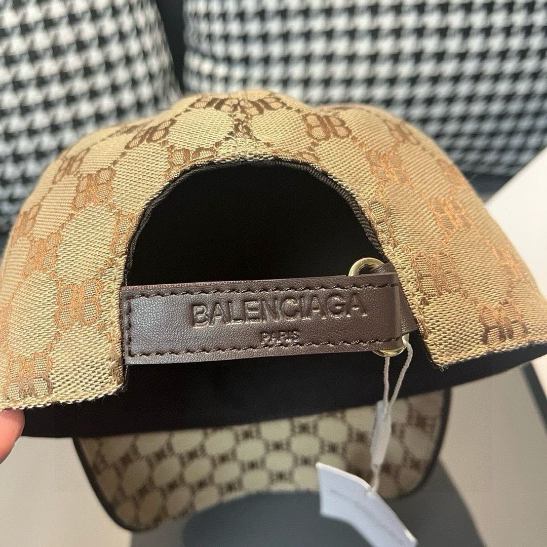 Beige baseball cap with BALENCIAGA strap patch and black inner brim