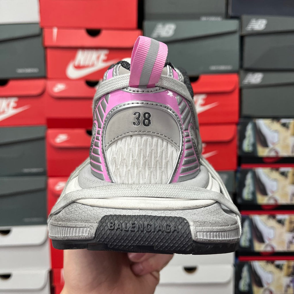 Balenciaga unisex sneaker rear view with pink heel tab and gray outsole