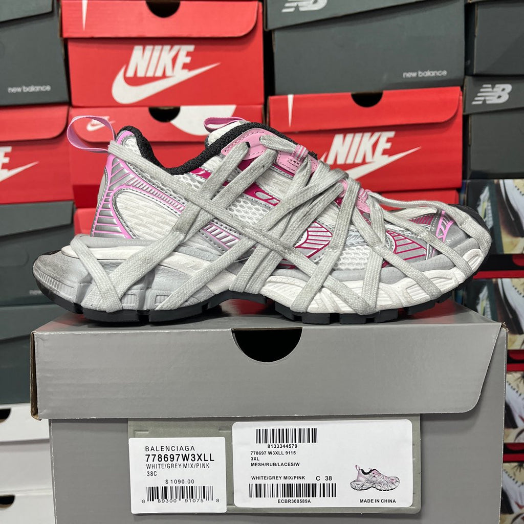 Balenciaga unisex sneaker pair in light gray with pink patterned side panels