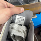 Sneaker inner size label with BALENCIAGA text and EUR/UK/US measurements