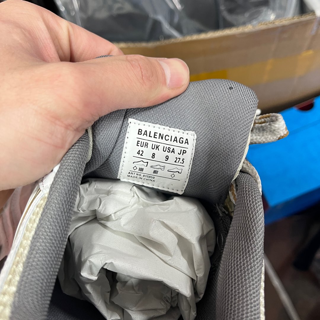 Sneaker inner size label with BALENCIAGA text and EUR/UK/US measurements