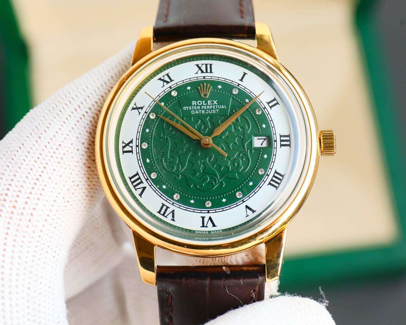 Rolex watch with green dial, gold-tone case, brown leather strap, Roman numerals