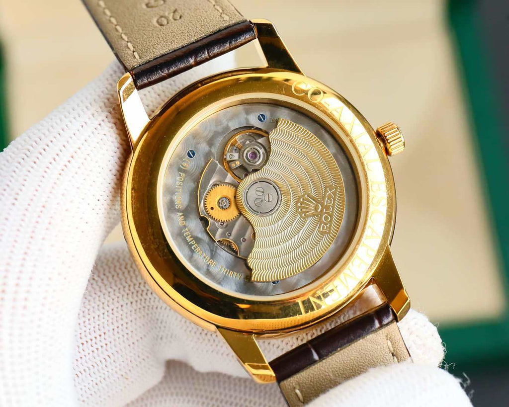 Rolex watch with open case back showing gears, gold-tone rim, brown leather strap