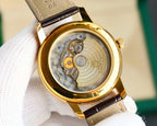 Rolex watch with open case back showing gears, gold-tone rim, brown leather strap