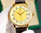 Rolex watch with yellow dial, gold-tone case, brown leather strap, Roman numerals