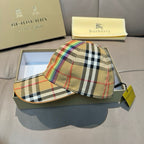 Plaid Burberry cap with multicolor stripe top and contrasting brim stitching.