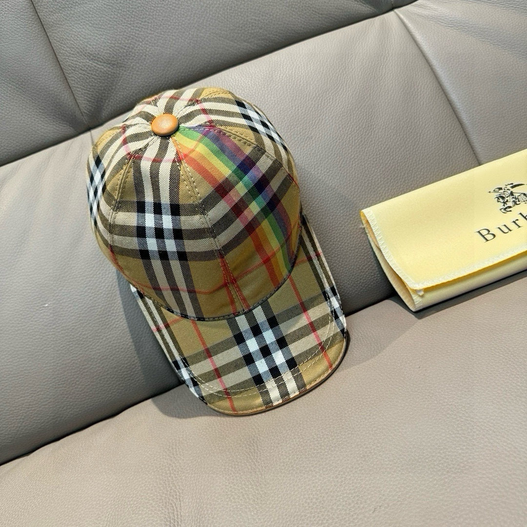 Plaid cap in beige with multicolor stripes, curved brim, and button crown detail.