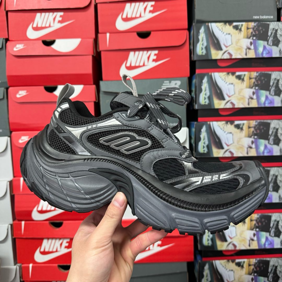 Black and gray Balenciaga lace-up sneaker with mesh upper and chunky rubber sole