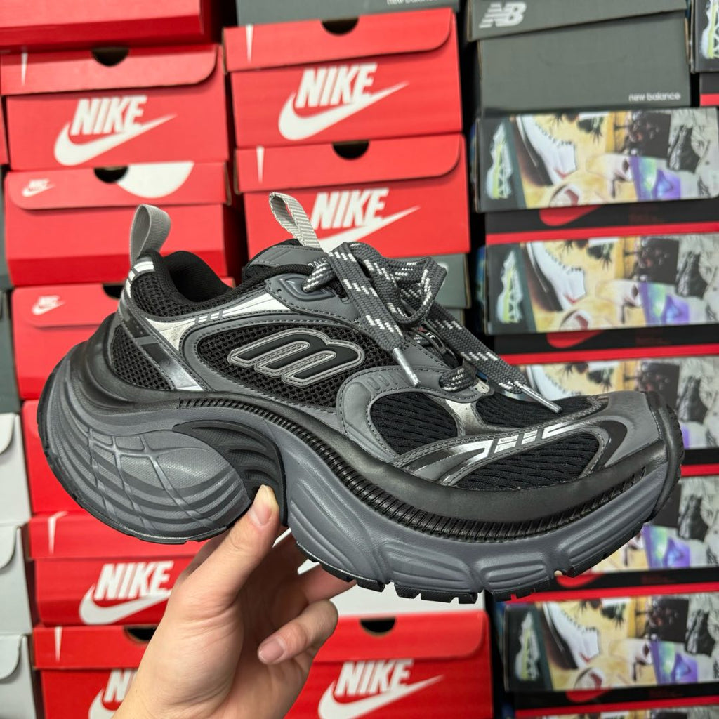 Black and gray lace-up sneaker with mesh upper and chunky rubber sole, Balenciaga