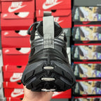 Back view of black Balenciaga sneaker with rubber heel tread and lace-up top