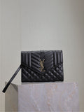 YSL small black quilted leather shoulder bag with flap and gold YSL logo.