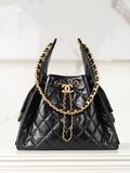 Chanel quilted black leather mini bag with gold chain handles and tassel detail
