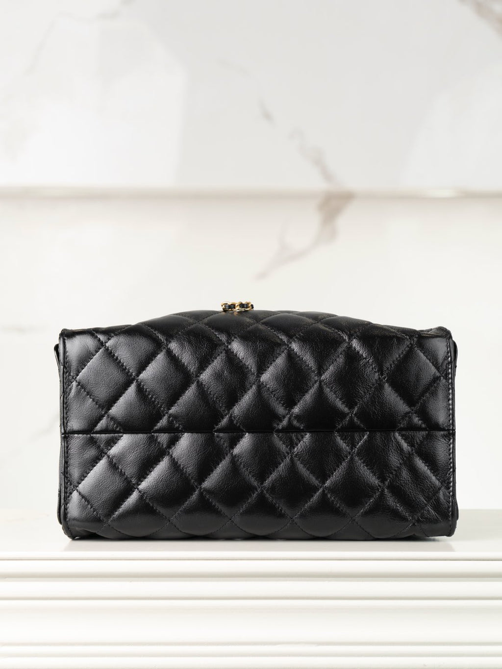 Chanel black quilted leather flap bag with front quilting and gold hardware