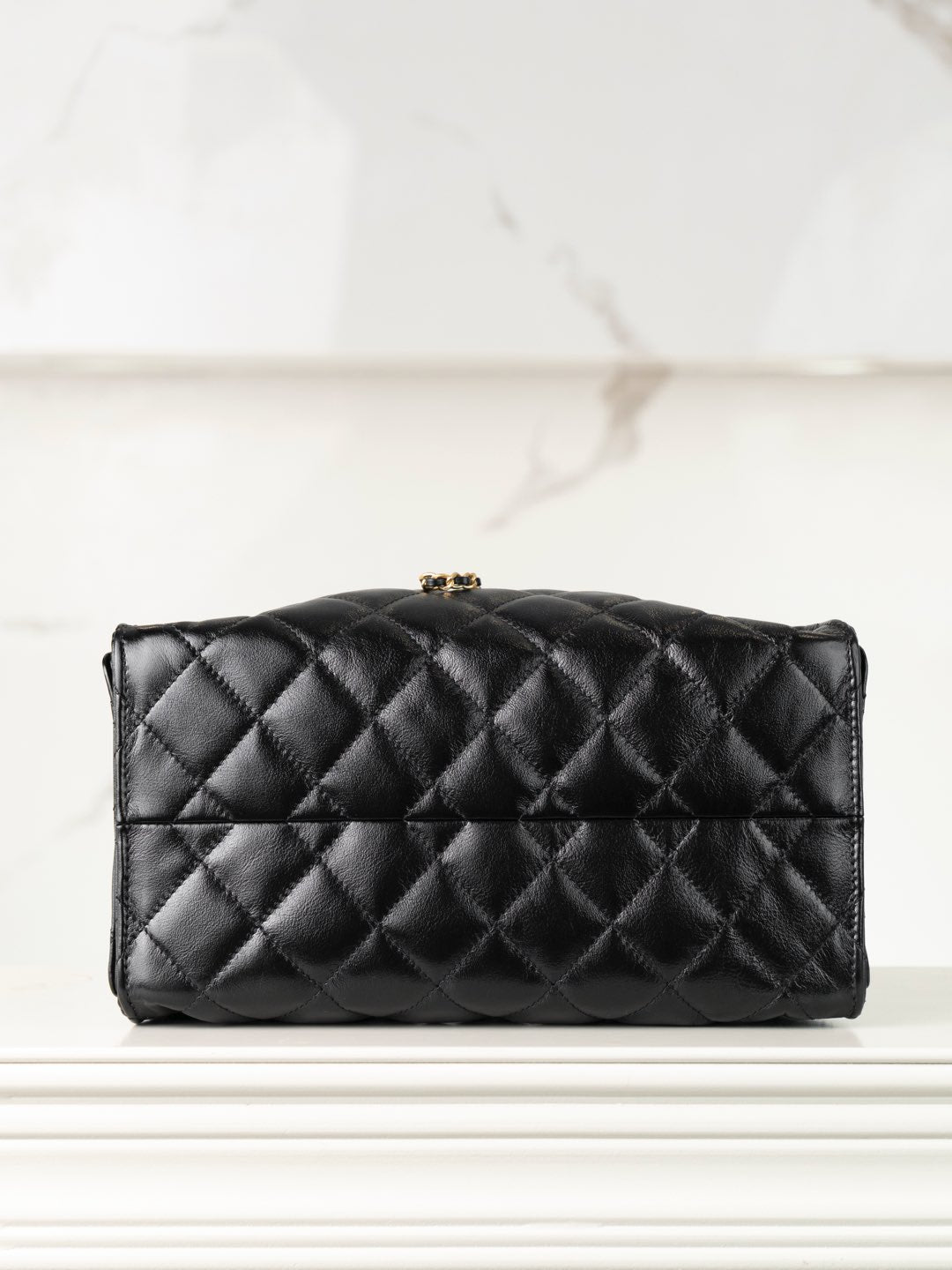 Chanel black quilted leather flap bag with front quilting and gold hardware