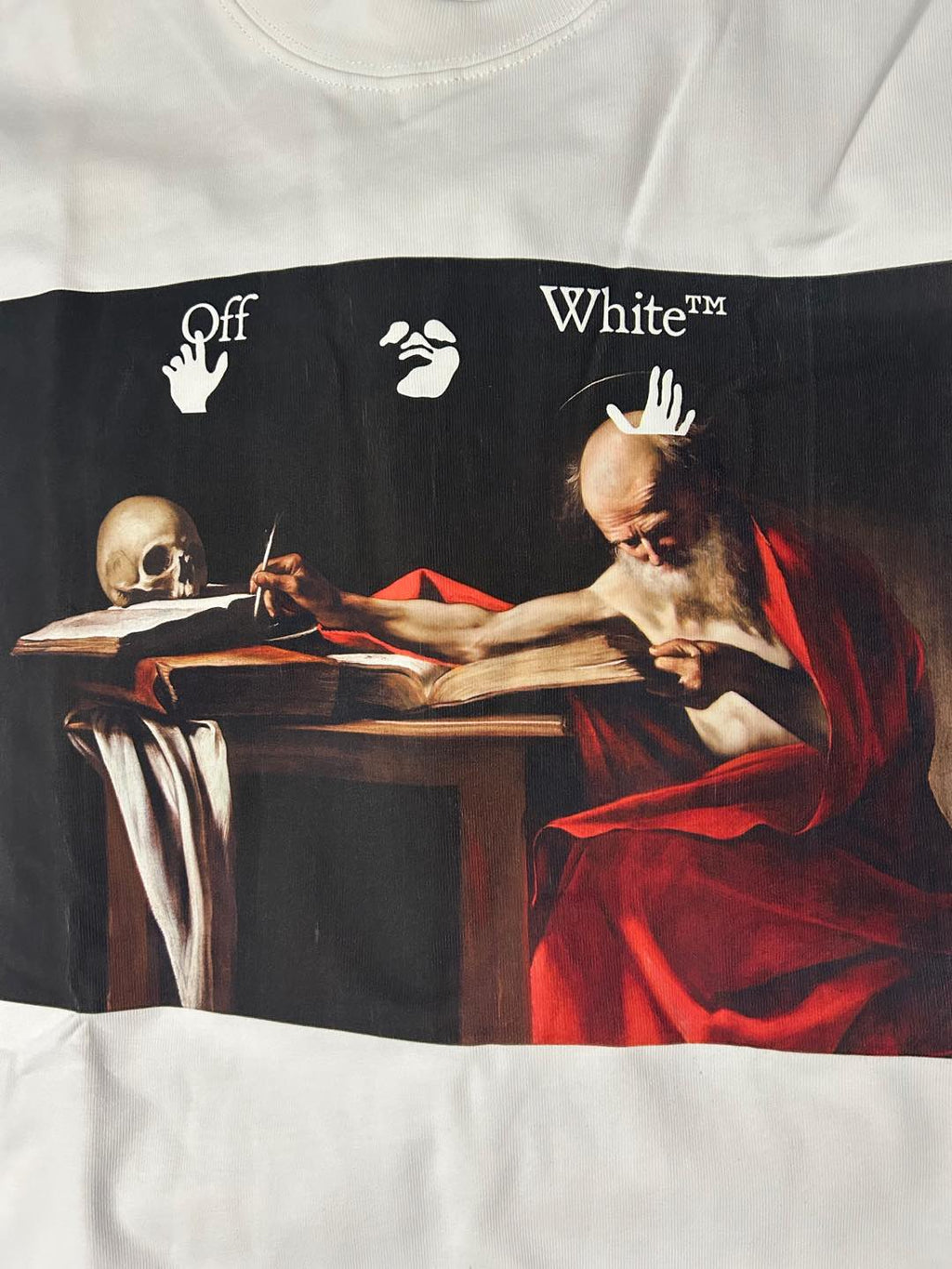 Off-White graphic T-shirt, close-up of black panel with red devil artwork