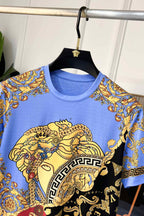 Light blue crewneck T-shirt with Medusa head and gold baroque detailing