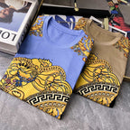 Crewneck T-shirts set: light blue and tan, both with ornate gold Greek key prints