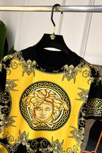 Short-sleeve graphic T-shirt in black with yellow Medusa-style front print