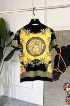 Short-sleeve graphic T-shirt in black with yellow Medusa-style center print
