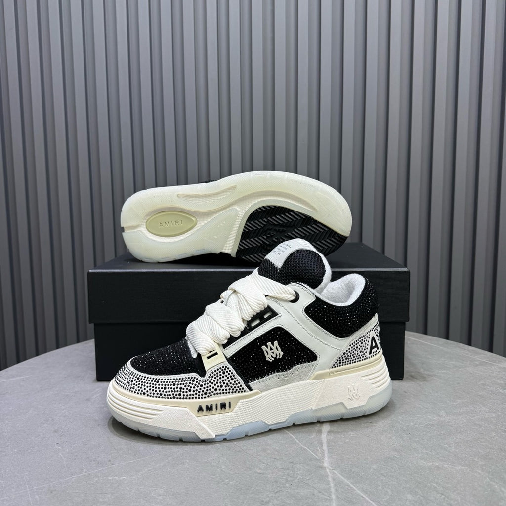 Black and white sneakers with angled side view and cushioned sole