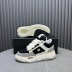 Black and white sneakers with angled side view and cushioned sole