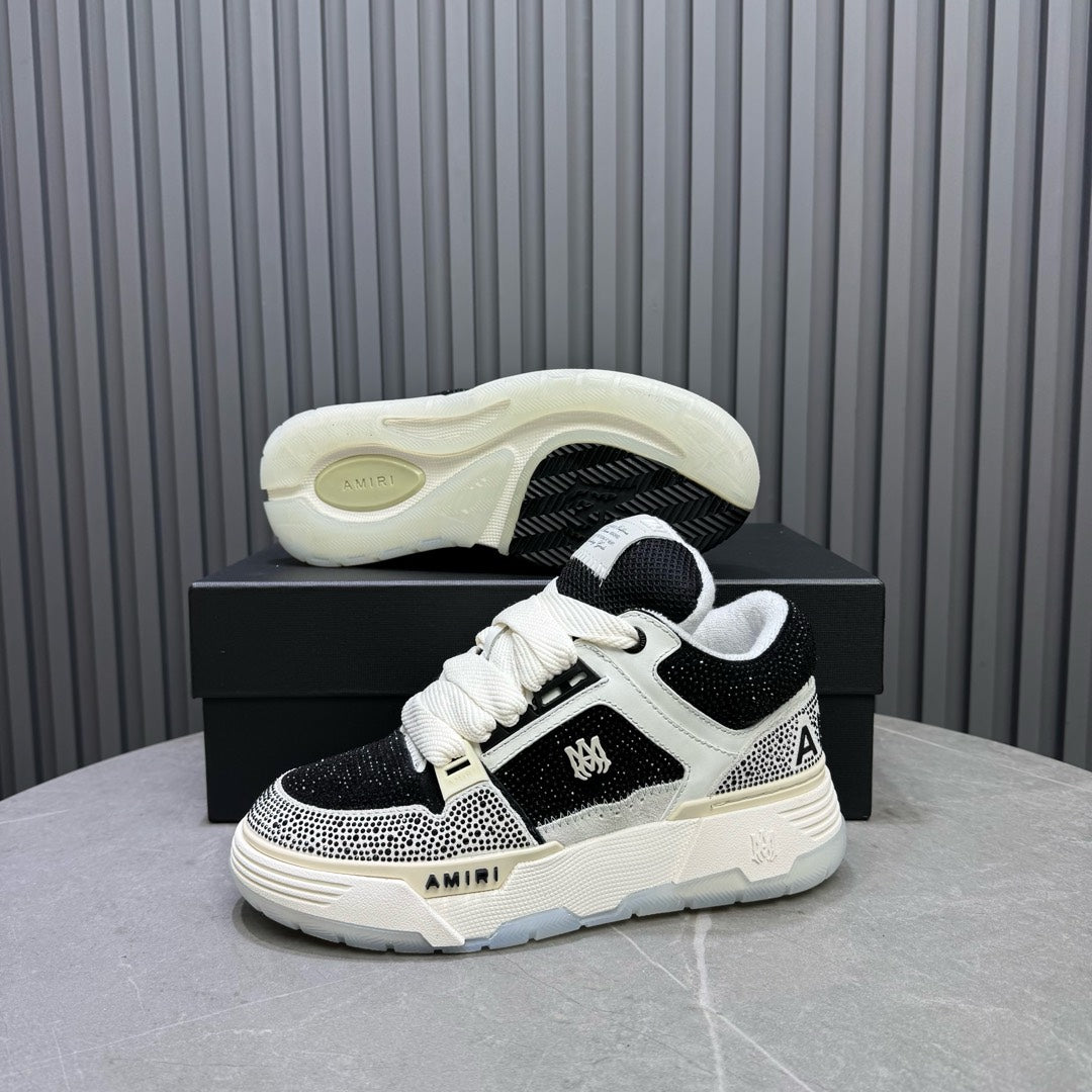 Black and white sneakers with angled side view and cushioned sole