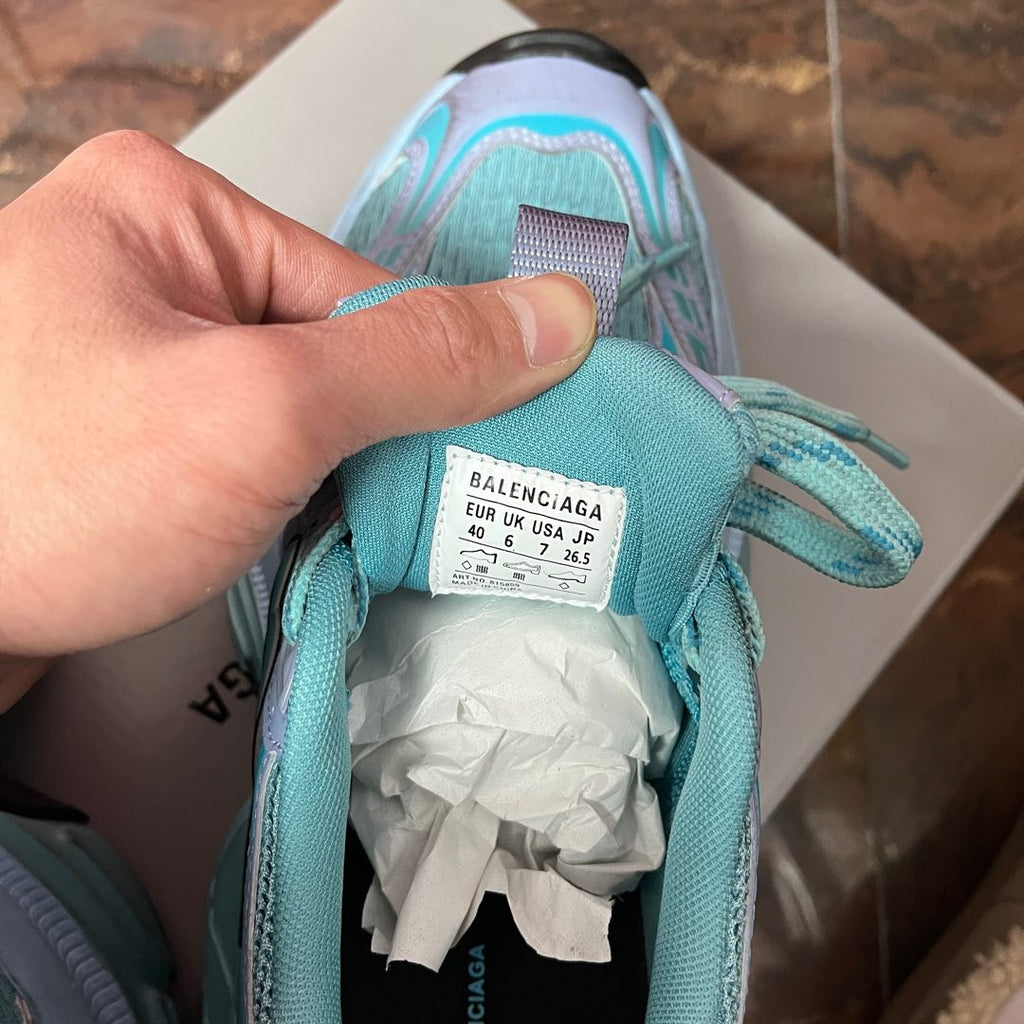 Balenciaga size label inside teal sneaker with lace collar trim