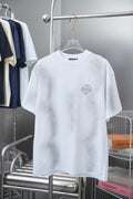 White short-sleeve T-shirt with small multicolor gemstone-style chest graphic
