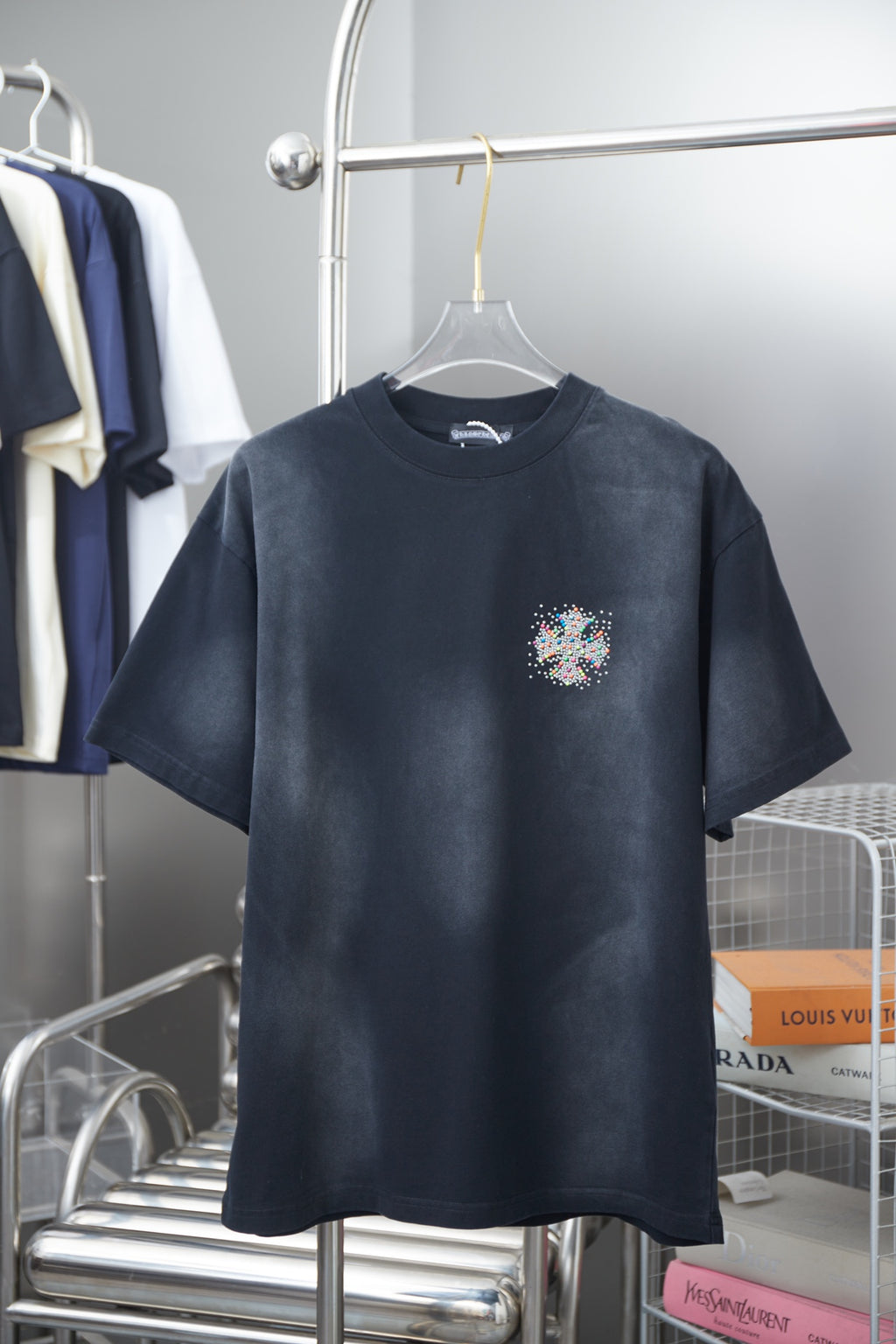 Navy short-sleeve T-shirt with small multicolor rhinestone chest emblem
