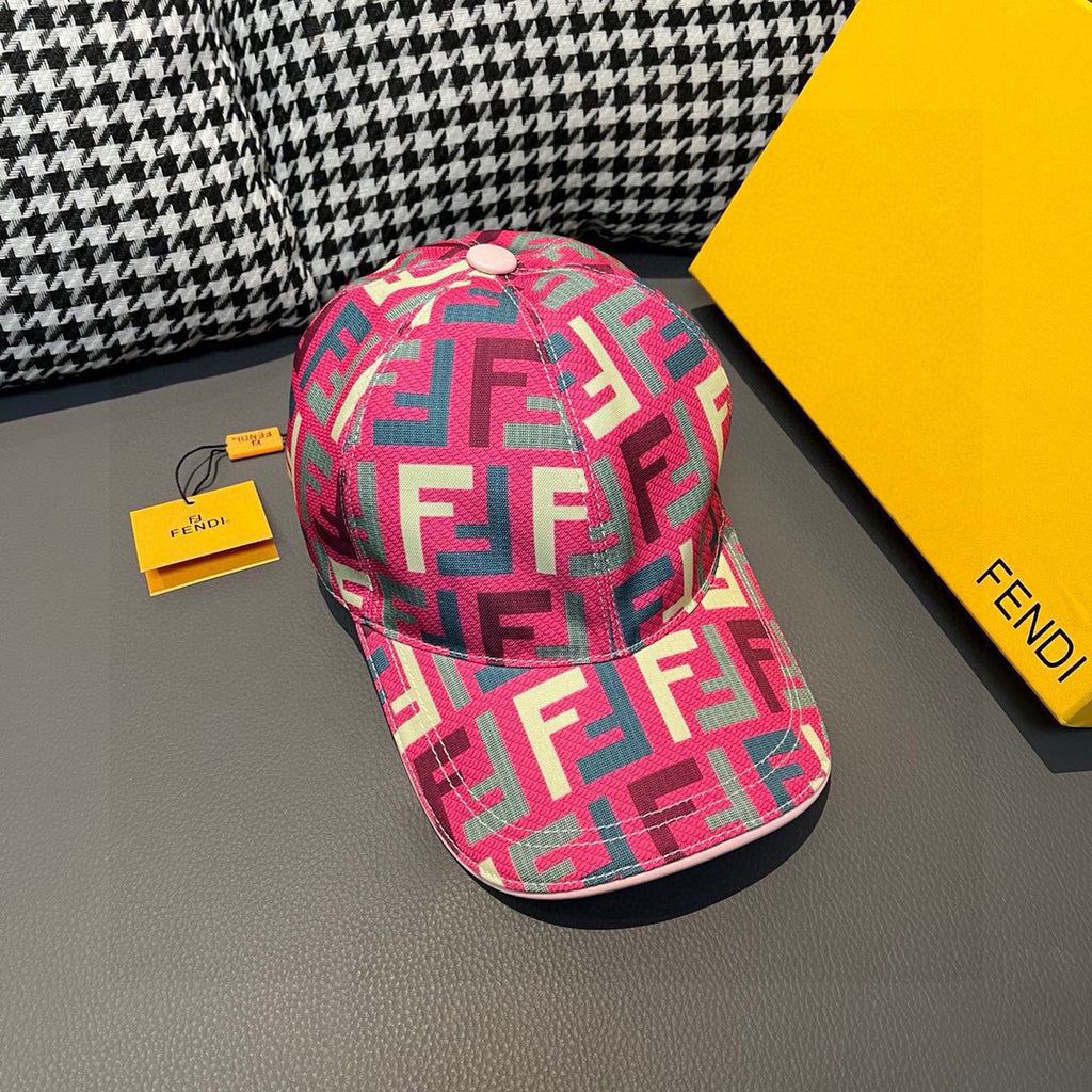 Fendi baseball cap with FF logo pattern in pink, teal, and cream; curved brim