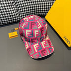 Fendi baseball cap with FF logo pattern in pink, teal, and cream; curved brim