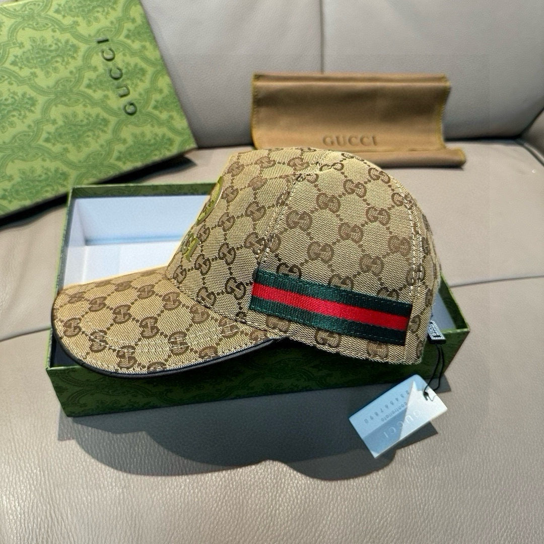 Gucci cap in tan GG monogram with red-and-green web stripe across front panel