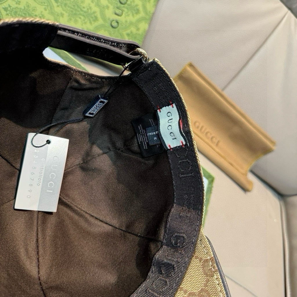 Gucci cap interior view with black strap and fabric lining
