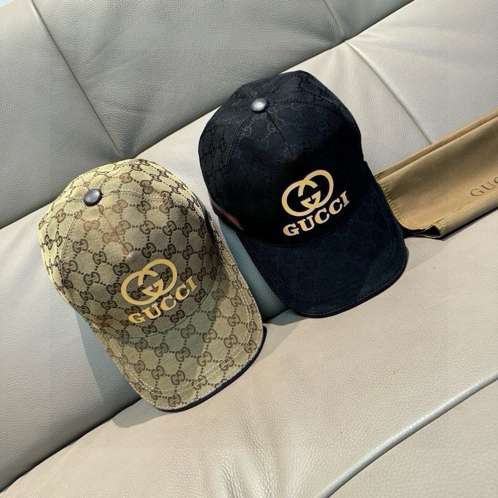 Gucci caps: one tan GG monogram and one black with gold double-G logo
