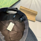 Gucci cap interior lining with adjustable strap and multiple hanging tags