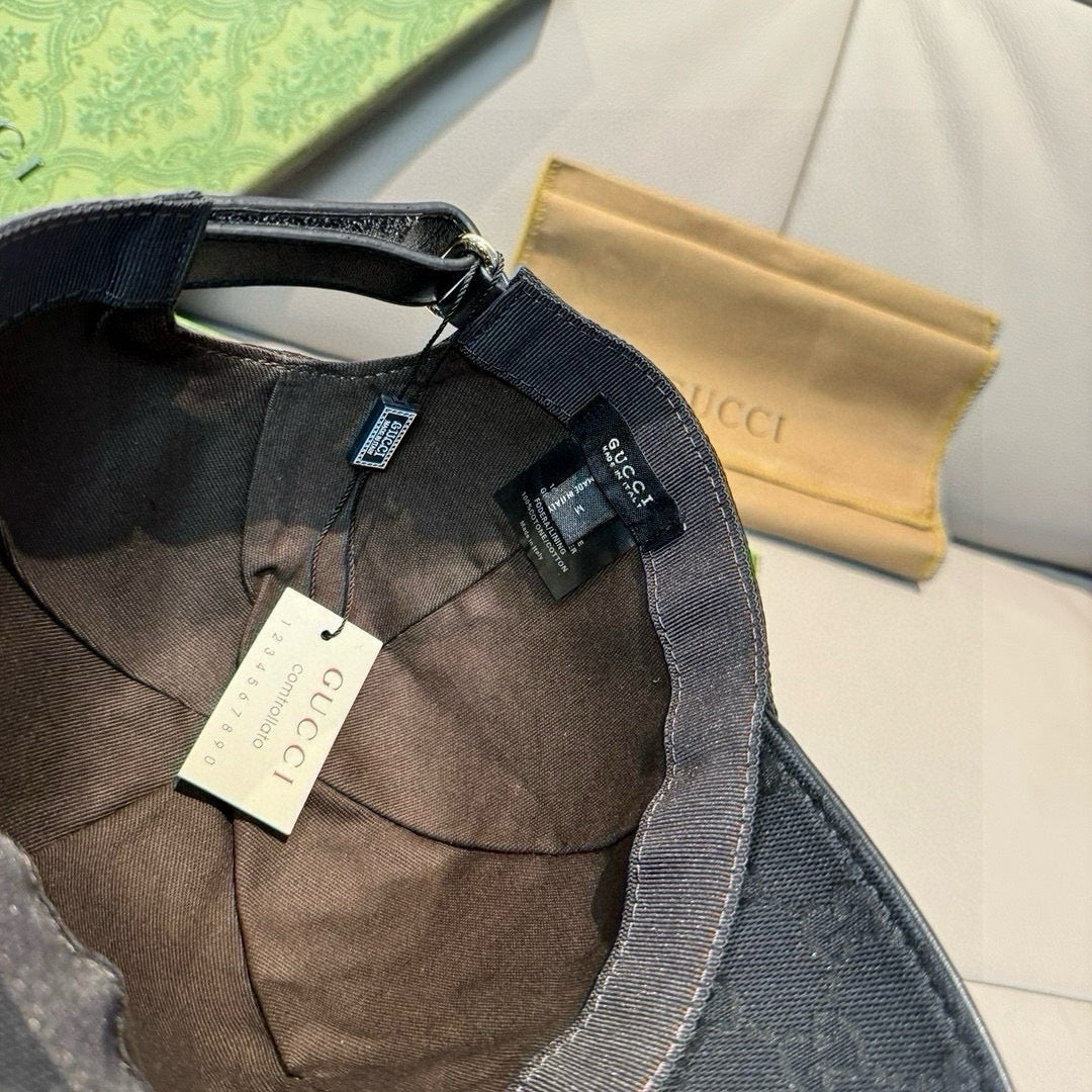Gucci cap interior lining with adjustable strap and multiple hanging tags