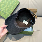 Gucci cap interior showing dark lining and hanging care tags