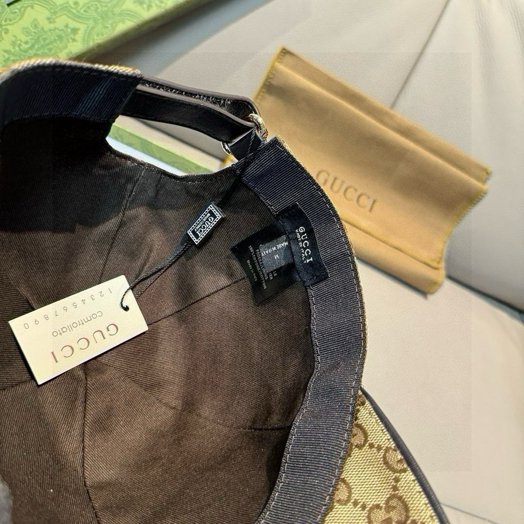Gucci cap with interior black band and adjustable strap, visible label tag