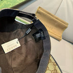 Gucci cap with interior black band and adjustable strap, visible label tag